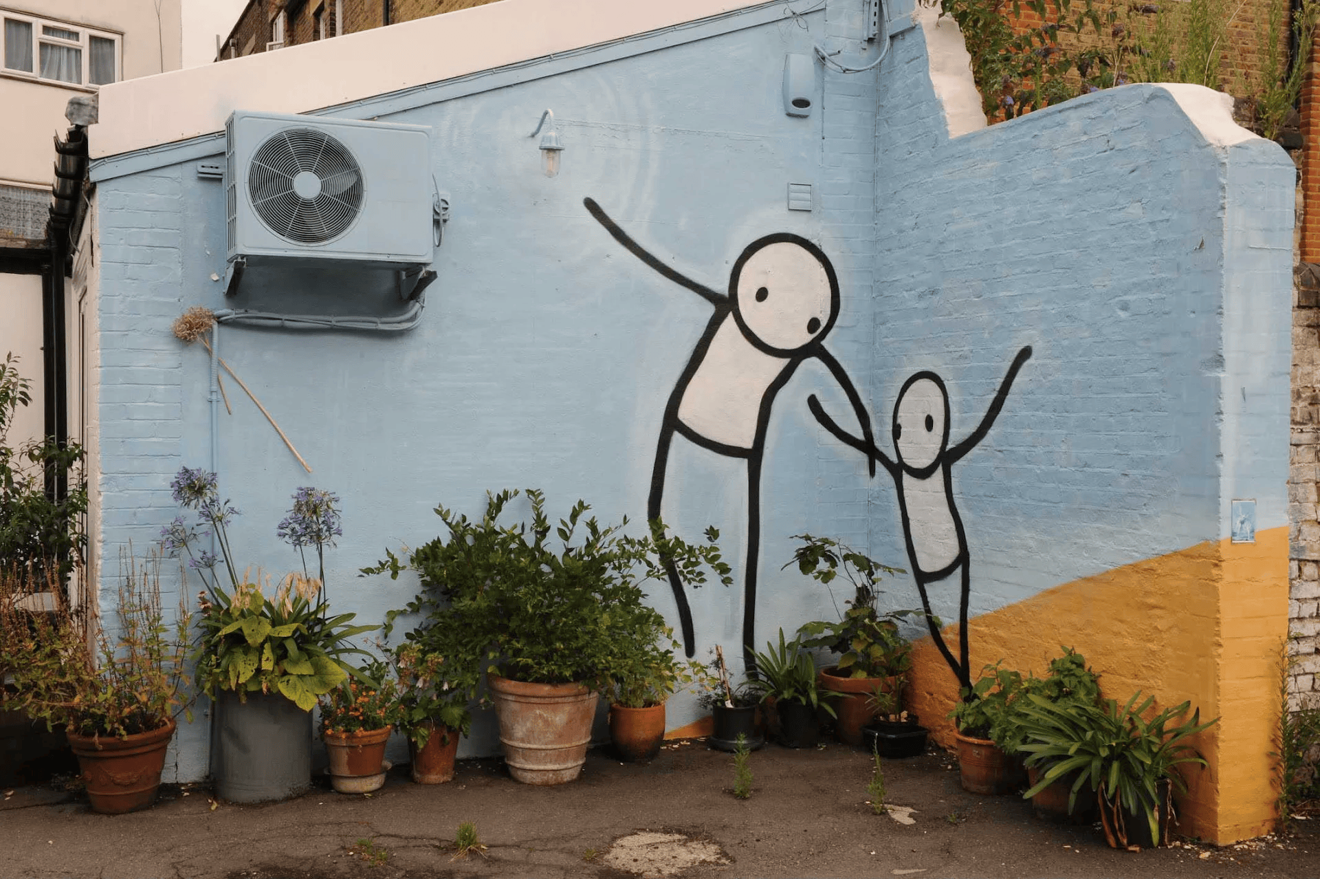 Street art by Stik at Blackwater Court, East Dulwich, London